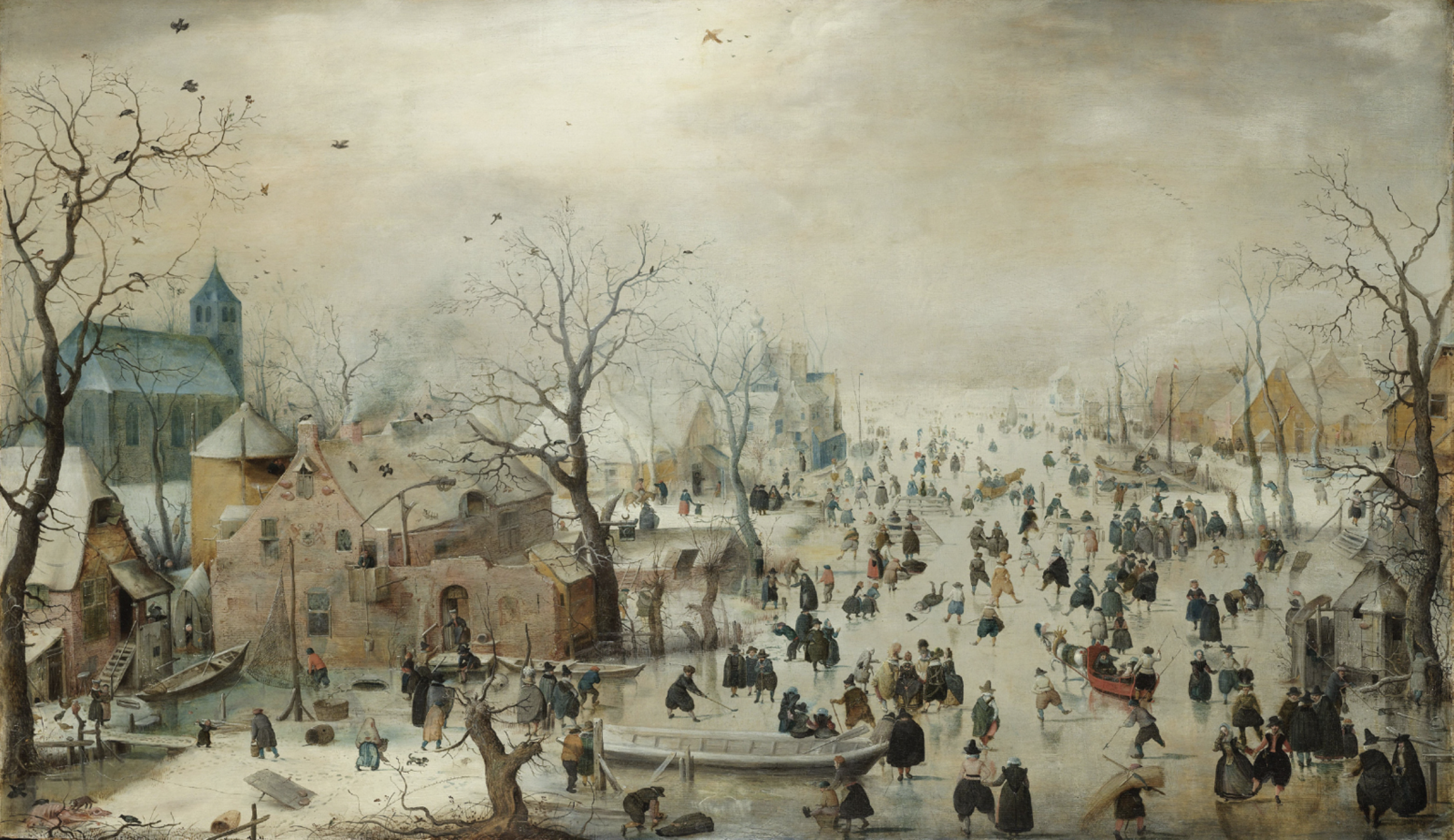 People skating on the frozen 16th Century Dutch landscape.